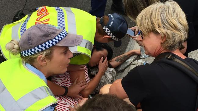 A woman, believed to be Ms Cullen, lays injured on the ground during the Invasion Day rally in 2017. Picture: Ian Paterson