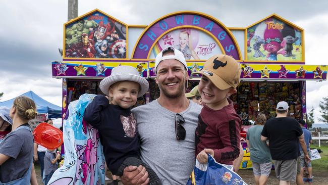 Grant Berry and his kids Mackenzie Rose, 3, and Cooper, 4, enjoyed the showbags. Picture: AAP/Matthew Vasilescu