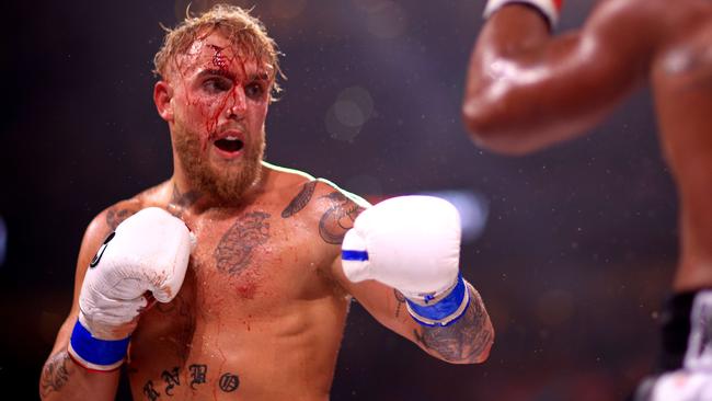 TAMPA, FLORIDA - DECEMBER 18: Jake Paul fights Tyron Woddley during a Paul Woodley II on December 18, 2021 in Tampa, Florida. Mike Ehrmann/Getty Images/AFP == FOR NEWSPAPERS, INTERNET, TELCOS &amp; TELEVISION USE ONLY ==