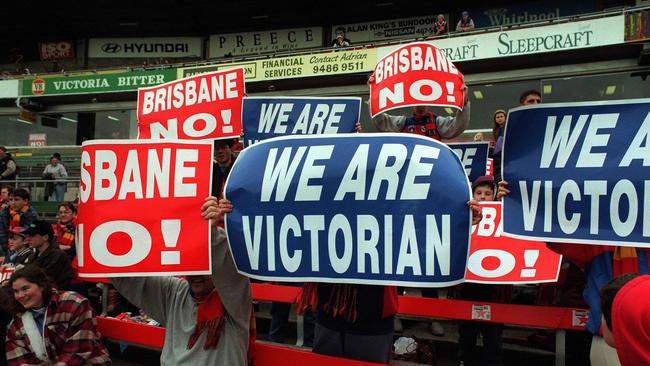 Fitzroy fans with anti-merger protest signs – August 17, 1996.