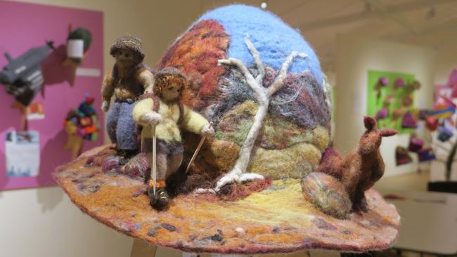 One of the more intricate beanies on display includes figurines of Larapinta Trail walkers, complete with kangaroos, rocks and other native wildlife. Picture: Laura Hooper