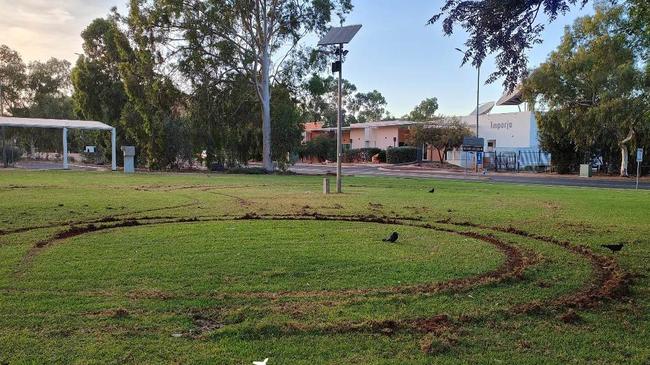 The vehicles caused damage to the lawns adjacent to Alice Springs Local Court. Supplied: Shane Martyn