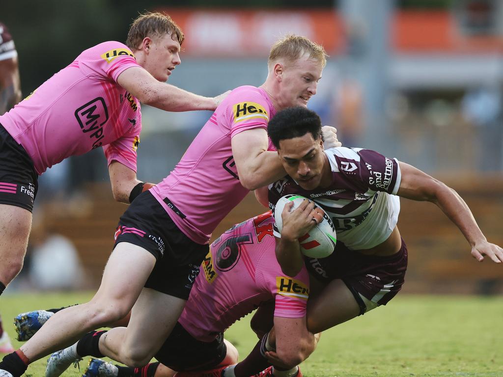 Lehi Hopoate is tackled. Picture: Mark Metcalfe/Getty Images