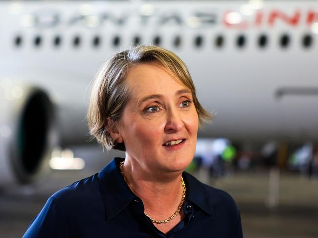 SYDNEY, AUSTRALIA - FEBRUARY 22: Qantas chief executive Vanessa Hudson speaks during a media opportunity at Hangar 96, Qantas Sydney Jet Base on February 22, 2024 in Sydney, Australia. Qantas has demonstrated a significant financial turnaround, reporting a record $2.47 billion profit for the 2022-23 fiscal year, marking a stark change from the previous year's $1.86 billion loss. The airline's strong performance was attributed to robust travel demand and high ticket prices, with domestic earnings before interest and taxes (EBIT) jumping to 18.2%, representing a 50% increase in profit margins over the past six years. The company's return on invested capital also increased to 103.6%, reflecting its improved financial position and operational performance. (Photo by Jenny Evans/Getty Images)