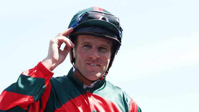 SYDNEY, AUSTRALIA - JANUARY 25: Tommy Berry riding Political Debate  win Race 5 Drinkwise during Sydney Racing at Royal Randwick Racecourse on January 25, 2025 in Sydney, Australia. (Photo by Jeremy Ng/Getty Images)