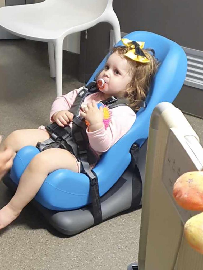 Samara using her support chair for her use in hospital during her stay.