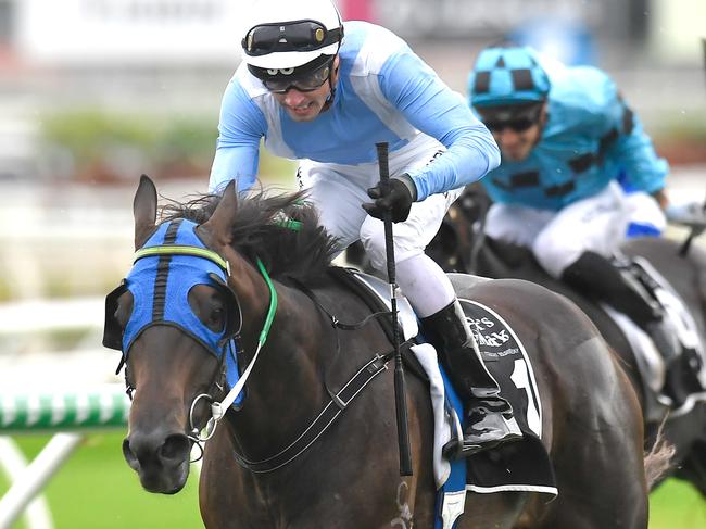 Jockey James Orman rides Master Jamie to victory in race 8, the QTIS 3YO Handicap, during Saturday Raceday at Eagle Farm Racecourse in Brisbane, Saturday, February 8, 2020. (AAP Image/Albert Perez) NO ARCHIVING, EDITORIAL USE ONLY
