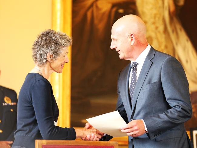 New Tasmanian Premier Peter Gutwein alongside Tasmanian Governor General Kate Warner as he is sworn in as the new Premier at Government House. Picture: ZAK SIMMONDS