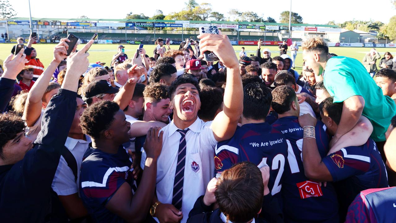 LANGER trophy schoolboy rugby league grand final between Palm Beach Currumbin SHS and Ipswich SHS. Ipswich SHS students celebrate with their winning team. Picture: NIGEL HALLETT