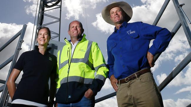 GHD consultant Sarah Fitzgerald, UPC chief operations manager David Pollington and land owner John Hammond at the wind monitoring station for the proposed wind farm at Robbins Island. Picture: CHRIS KIDD