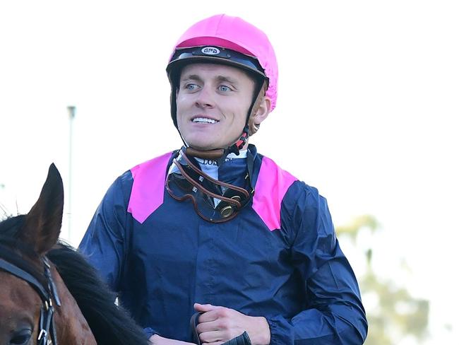 Brodie Loy bolts clear on Holyfield to win the Listed Eye Liner Stakes at Ipswich for trainer Annabel Neasham. Picture: Grant Peters - Trackside Photography.