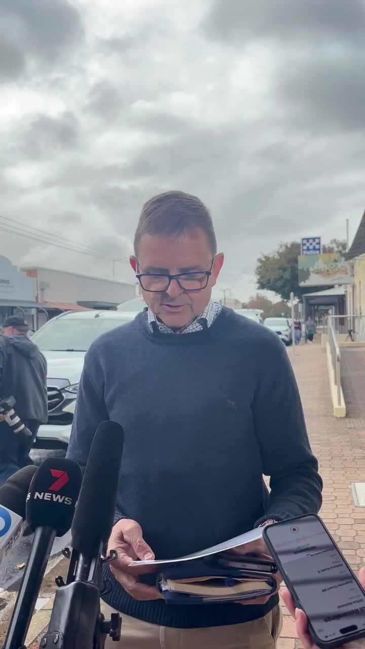 Nick McBride addressing the media following his brief court hearing