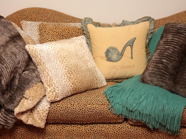 Cushions: I love cushions and throws. The one that says Tres Bombshell is quite cute. I bought that one for Johanna Murray-Smith as well because she wrote a play I was in called Bombshells.