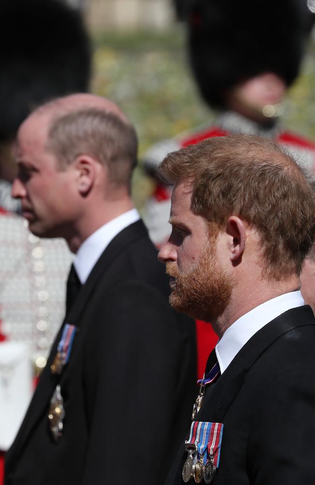 Prince William and Prince Harry exchanged brief words outside Prince Philip’s funeral, according to lip readers. Picture: Getty Images