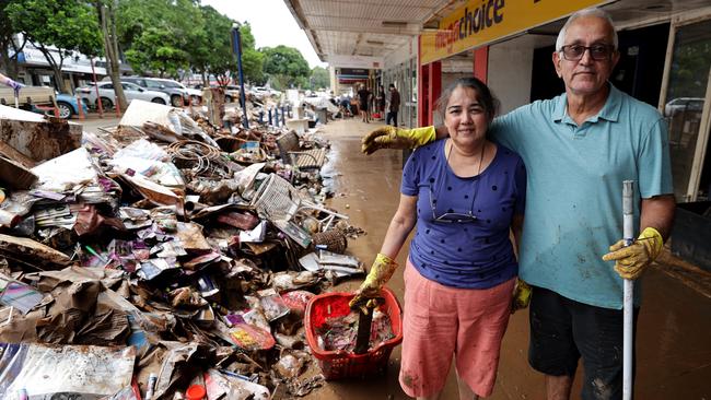 Saras and Jashree Solanki start the clean-up. Pictures: Toby Zerna