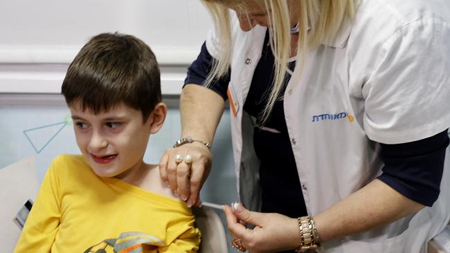 An Israeli boy receives a dose of the Pfizer Covid-19 vaccine. Picture: AFP