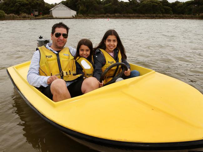 John with daughters Allegara, 8, and Zara, 12 (refused to give surname) enjoying summer on the Anglesea River. Picture: Alison Wynd