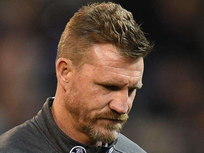 Magpies coach Nathan Buckley is seen during the Round 14 AFL match between the Collingwood Magpies and the Carlton Blues at the MCG in Melbourne, Sunday, June 24, 2018. (AAP Image/Julian Smith) NO ARCHIVING, EDITORIAL USE ONLY