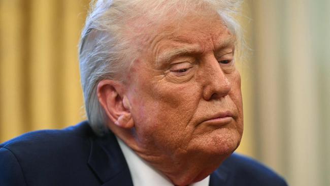 US President Donald Trump speaks to the press after signing an executive order to create a US sovereign wealth fund, in the Oval Office of the White House on February 3, 2025, in Washington, DC. (Photo by Jim WATSON / AFP)