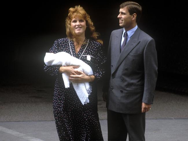 Prince Andrew, Duke of York, and Sarah, Duchess of York, leave Portland Hospital, London, with their newborn daughter Princess Beatrice in 1988. Picture: Getty Images.