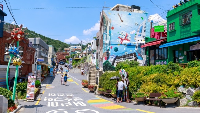 <h2><span>5. Fill up on unique culture </span></h2><p><span>From Squid Games to BTS, fewer nations are having more of an impact on global pop culture right now but its history is just as fascinating. The Huinnyeoul Culture Village in downtown Busan is an ideal starting point. This network of 14 alleyways is festooned with cafes, workshops, bookstores and some marvellous murals. If you’re a fan of the Korean smash hit The Attorney, you’ll also spot Jinwoo’s Wall. Enjoyed this experience? We also highly recommend the <a href="https://www.gamcheon.or.kr/">Gamcheon Cultural Village</a> (pictured), a steep-sided complex known as the Macchu Pichu of Busan which embraces the traditional arts of Korea.</span></p>