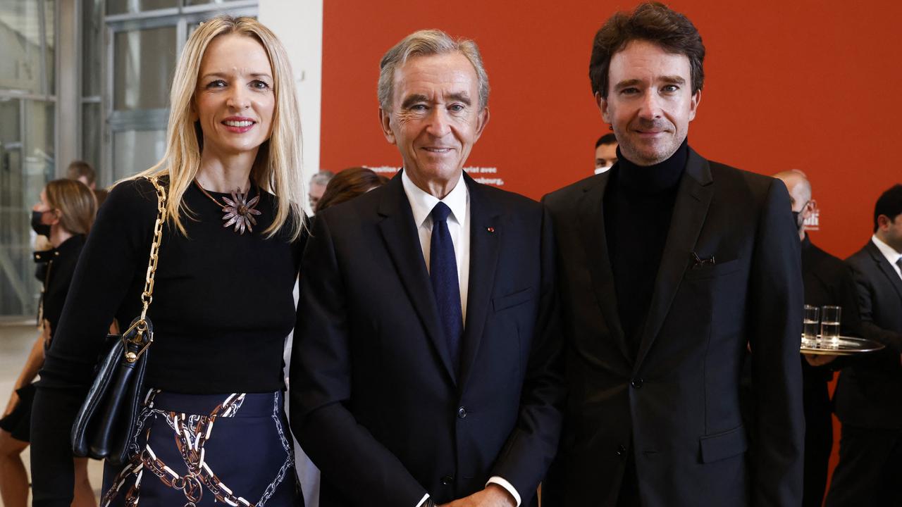 Head of LVMH luxury group, Bernard Arnault, his daughter Louis Vuitton Executive vice president Delphine Arnault and his son LVMH Communications head Antoine Arnault. Picture: 2021