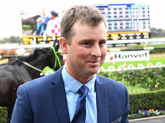 Jockey James McDonald speaks with trainer Stirling Osland after winning race 4, the TAB Highway Handicap on Radiant Choice during Rosehill Gardens Race Day at Rosehill Gardens in Sydney, Saturday, June 2, 2018. (AAP Image/David Moir) NO ARCHIVING, EDITORIAL USE ONLY