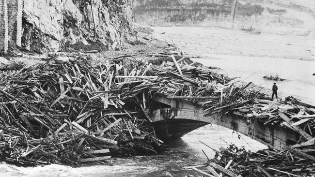 Debris from October 9th Vajont Dam tragedy covers this bridge on state road.