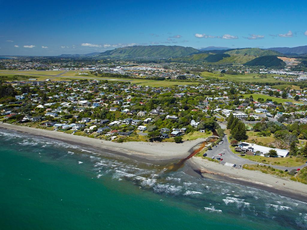 They were walking along Raumati Beach on the Kapiti Coast, north of Wellington. Picture: Alamy