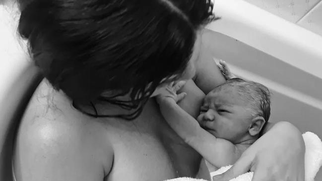 Mum Nikki Degabriele and Milah in the bath after birth. Picture: Nikki Degabriele