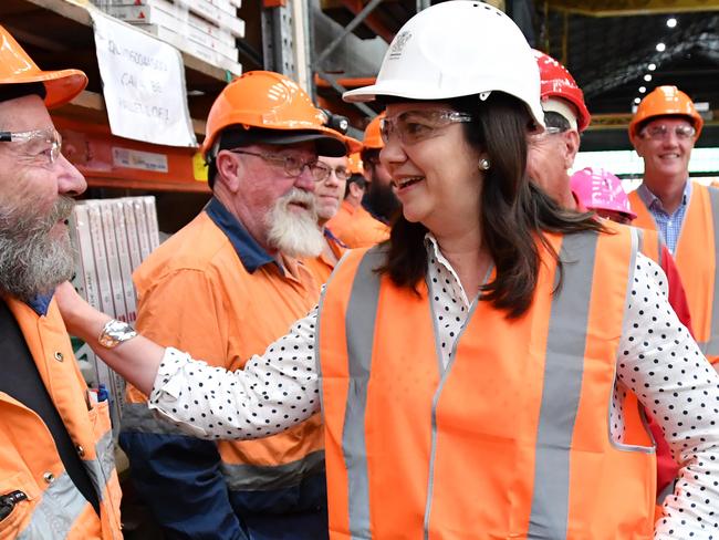 Queensland Premier Annastacia Palaszczuk (right)) is seen talking with workers at the Downer EDI Rail manufacturing plant in Maryborough during the Queensland Election campaign on Thursday, November 9, 2017. Premier Palaszczuk announced if re-elected her government would make a $150 million commitment to protect and create new jobs in the manufacturing sector. (AAP Image / Darren England) NO ARCHIVING