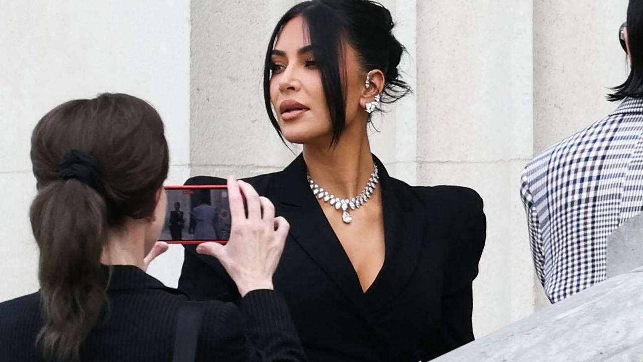 Kim dons massive necklace for robbery trial