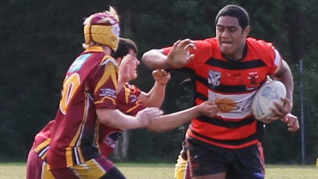 Jordan Mailata fending off defenders while playing for Bankstown.