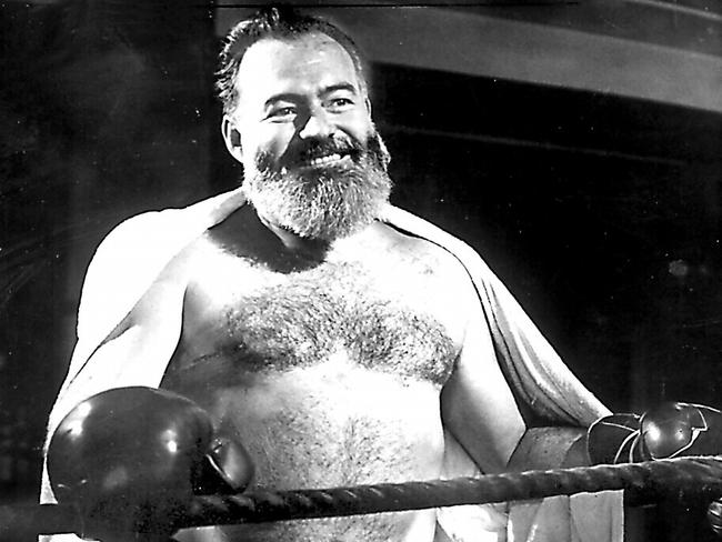 Author Ernest Hemingway boxing in training for life as a foreign correspondent in 1944.