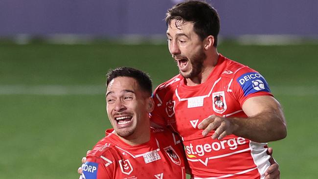 GOSFORD, AUSTRALIA - JULY 02: Dragons players celebrate the win from a Golden Point from Corey Norman during the round 16 NRL match between New Zealand Warriors and the St George Illawarra Dragons at Central Coast Stadium, on July 02, 2021, in Gosford, Australia. (Photo by Ashley Feder/Getty Images)