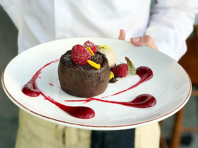 The Squire's Landing dark chocolate fondant with raspberries, crumble and Jack of Spades porter ice cream. Picture: Supplied