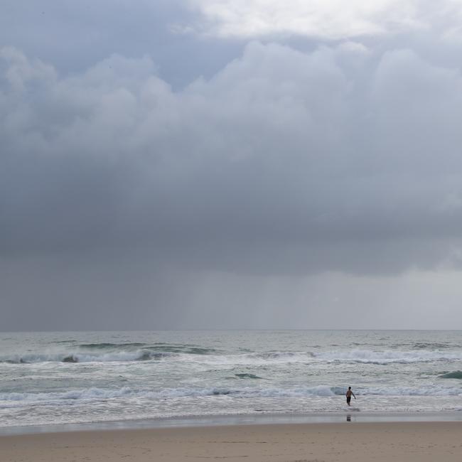 Day three of the Gold Coast lockdown. Lone swimmer at Broadbeach.. Picture Glenn Hampson