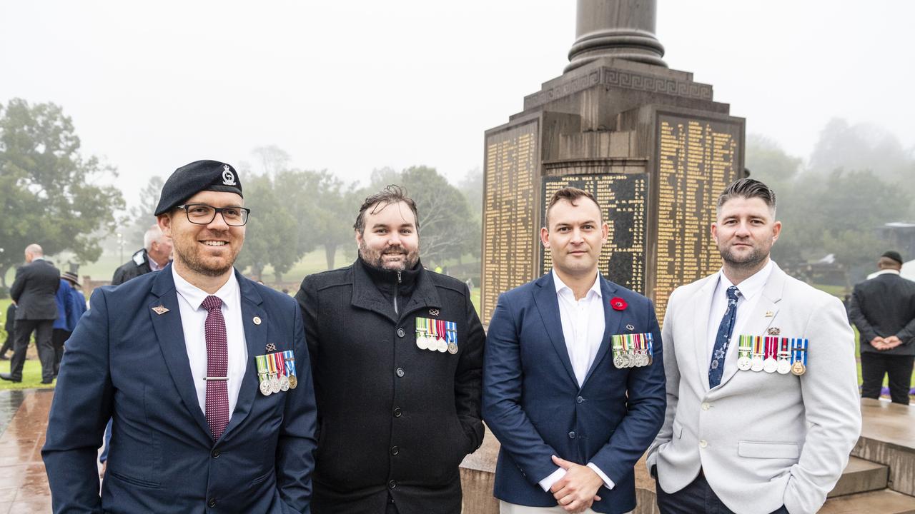 Army mates (from left) Mick Harro, Skipp Sealy, Mathew Vglik and Beau McNamara gather at the Mothers' Memorial after the Anzac Day dawn service, Monday, April 25, 2022. Picture: Kevin Farmer