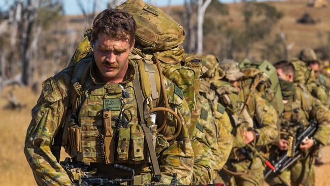 Australian Army Private Thomas Braybon, who serves with 2nd Battalion, The Royal Australian Regiment, patrols in formation near Stanage Bay, Queensland, Australia, July 17, during Exercise Talisman Sabre 2019. (U.S. Army photo by Sgt. 1st Class Whitney C. Houston)