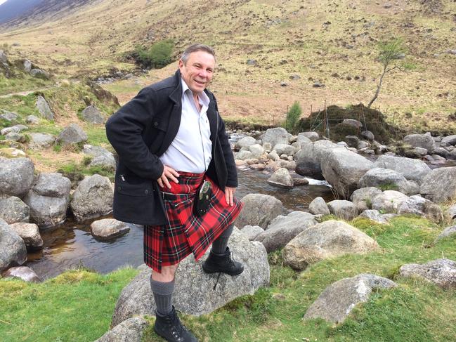 Charles Wooley covering the Scottish referendum in 2014, sporting the family tartan (MacGregor).