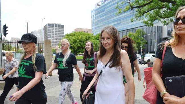 Jenny Hallam (in white) leaves the Adelaide Magistrates Court with supporters. Picture: AAP / Brenton Edwards