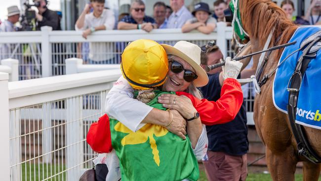 Jockey Caitlin Tootell and Kym Cadzow celebrate the Strathalbyn Cup win. Picture: Makoto Kaneko