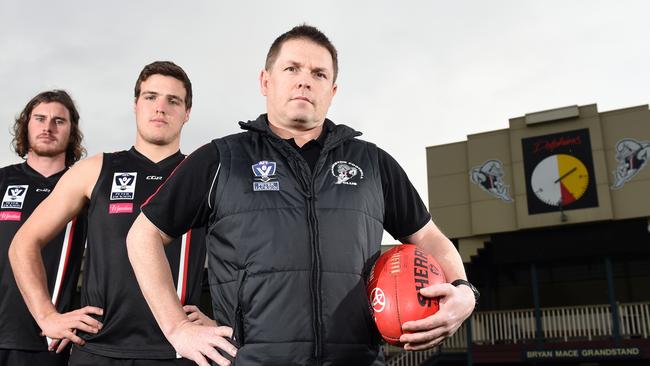 Frankston Dolphins senior coach Pat Hill with players Corey Buchan and Blake Mullane. Picture: Jason Sammon