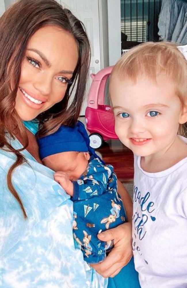 The fitness star with her daughter Mia, 2, and son Izaac. Picture: Instagram/EmilySkye