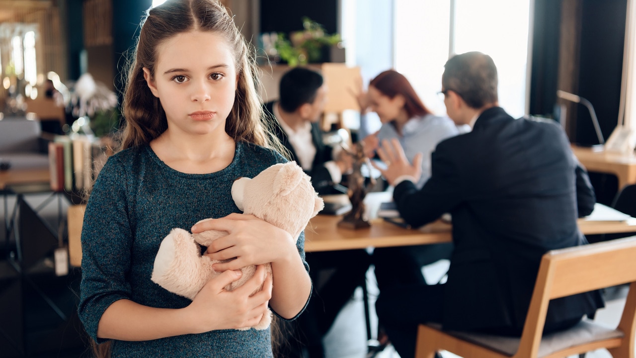 A small girl holds a teddy bear. Picture: shutterstock