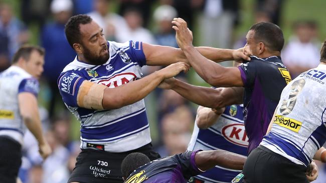 SYDNEY, AUSTRALIA — MARCH 03: Sam Kasiano of the Bulldogs and Will Chambers of the Storm fight during the round one NRL match between the Canterbury Bulldogs and the Melbourne Storm at Belmore Sports Ground on March 3, 2017 in Sydney, Australia. (Photo by Mark Kolbe/Getty Images)