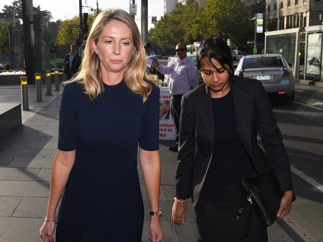 Sarah Britt (left) from AMP Limited leaves the Federal Court in Melbourne on Monday. Picture: James Ross