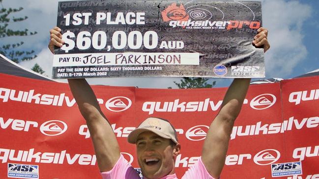 29/10/2012 SPORT: 10 Mar 2002: Joel Parkinson of Australia celebrates after winning the final of the Quiksilver Pro held at Snapper Rocks, Gold Coast, Australia. At his home break, Parkinson defeated Cory Lopez of the USA to claim the $60, 000 winner's cheque. Photo : ASP Tostee/GETTY IMAGES. Mandatory Credit: Getty Images/Getty Images Pic. Asp Supplied /