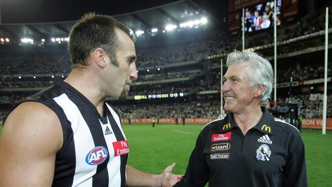 Anthony Rocca is congratulated by Mick Malthouse.