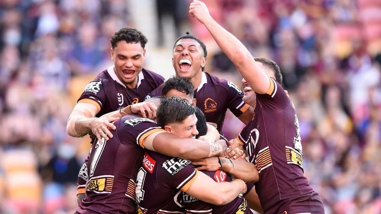 BRISBANE, AUSTRALIA - SEPTEMBER 04: Anthony Milford of the Broncos celebrates scoring a try with team mates during the round 25 NRL match between the Brisbane Broncos and the Newcastle Knights at Suncorp Stadium, on September 04, 2021, in Brisbane, Australia. (Photo by Matt Roberts/Getty Images)